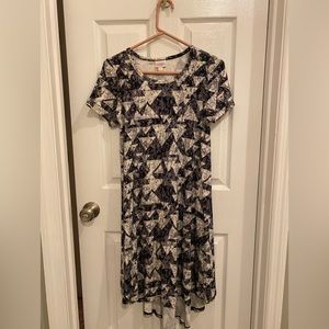 Two XXS LulaRoe Carly Swing Dresses.  1-Black & white, 2-Green & Black.
